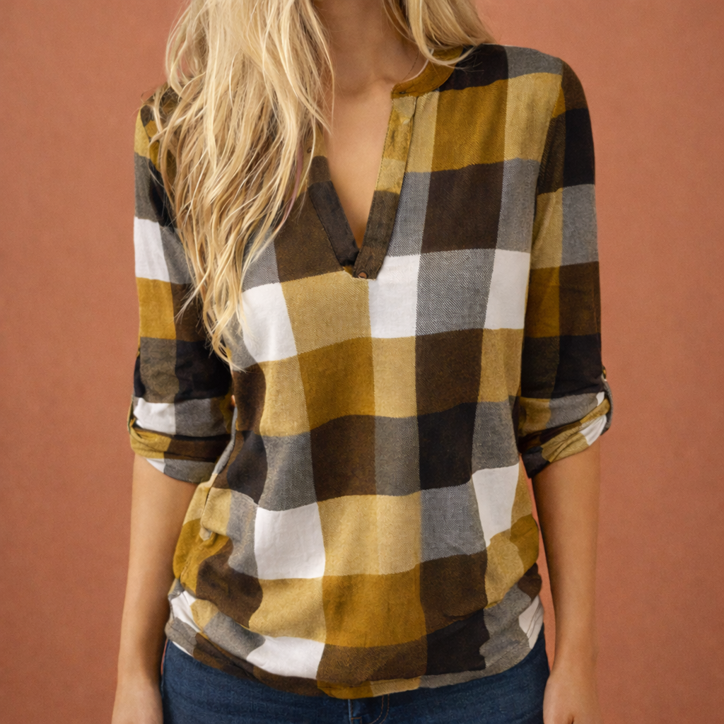 Dames blouse in geel met minimalistisch design, zacht en comfortabel voor casual en stijlvolle outfits.