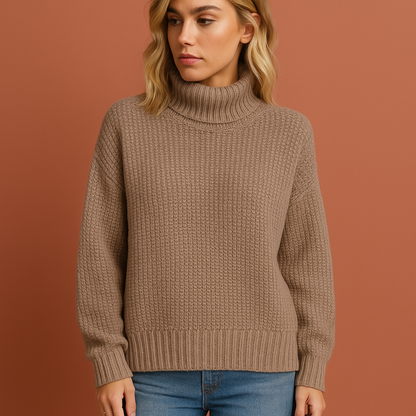 Dames coltrui in beige met moderne pasvorm, warm en comfortabel voor herfst en winter.