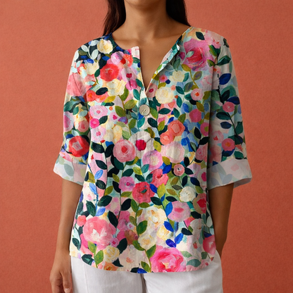 Dames blouse in blauw-roze met minimalistisch design, zacht en comfortabel voor casual en stijlvolle outfits.