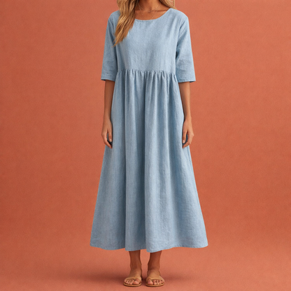 Dames maxi jurk in blauw met minimalistisch design, zacht en comfortabel voor casual en stijlvolle outfits.