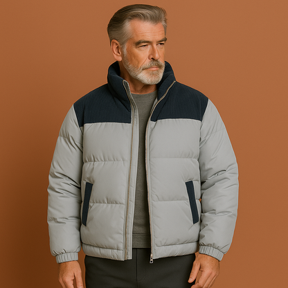 Blauwe heren pufferjas met moderne pasvorm en warme gewatteerde afwerking, ideaal voor koude dagen.
