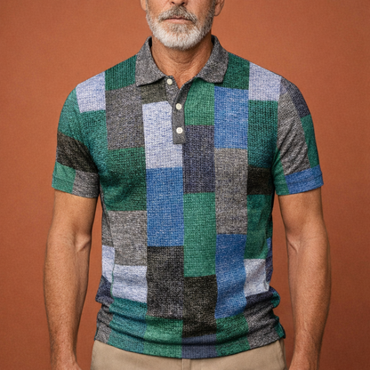 Heren polo in blauw met rasterpatroon, stijlvol en comfortabel voor casual en zomerse outfits.