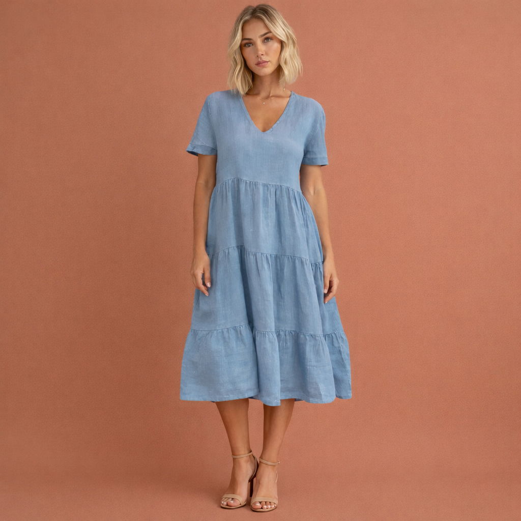 Blauwe midi-jurk met V-hals en zwierige volants voor dames, ideaal voor zomerse dagen, vakanties en feestelijke gelegenheden.