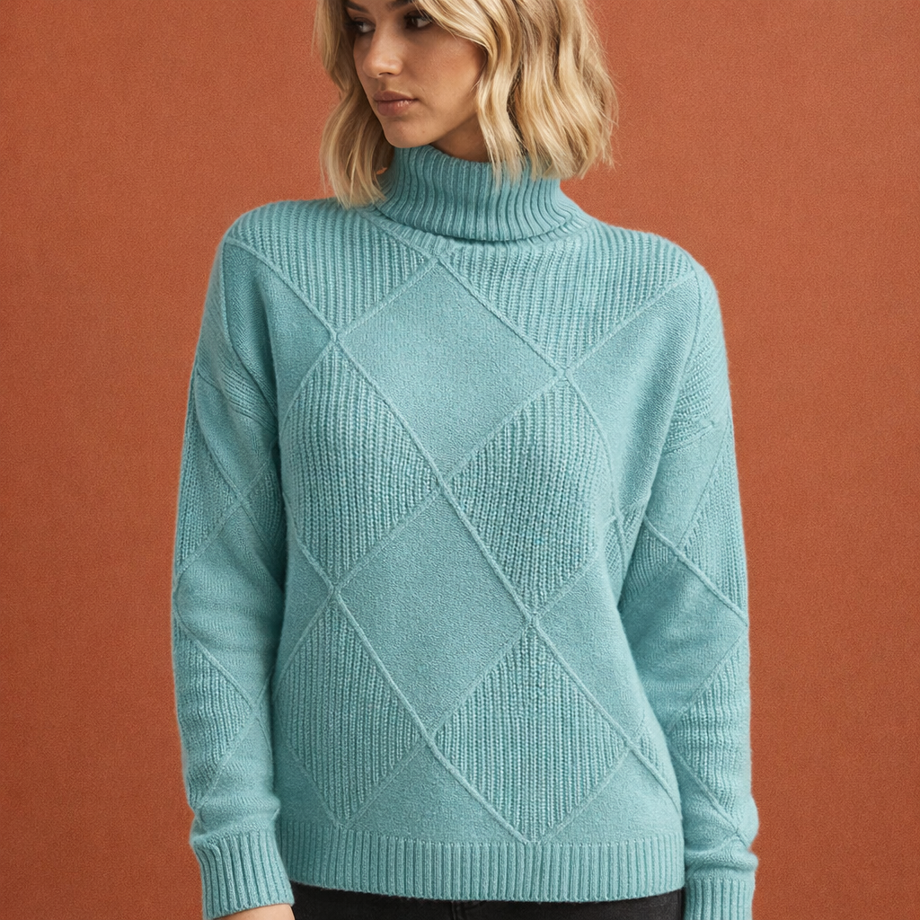 Blauwe warme wintertrui voor dames met een comfortabele pasvorm, ideaal voor dagelijks gebruik en koude dagen.