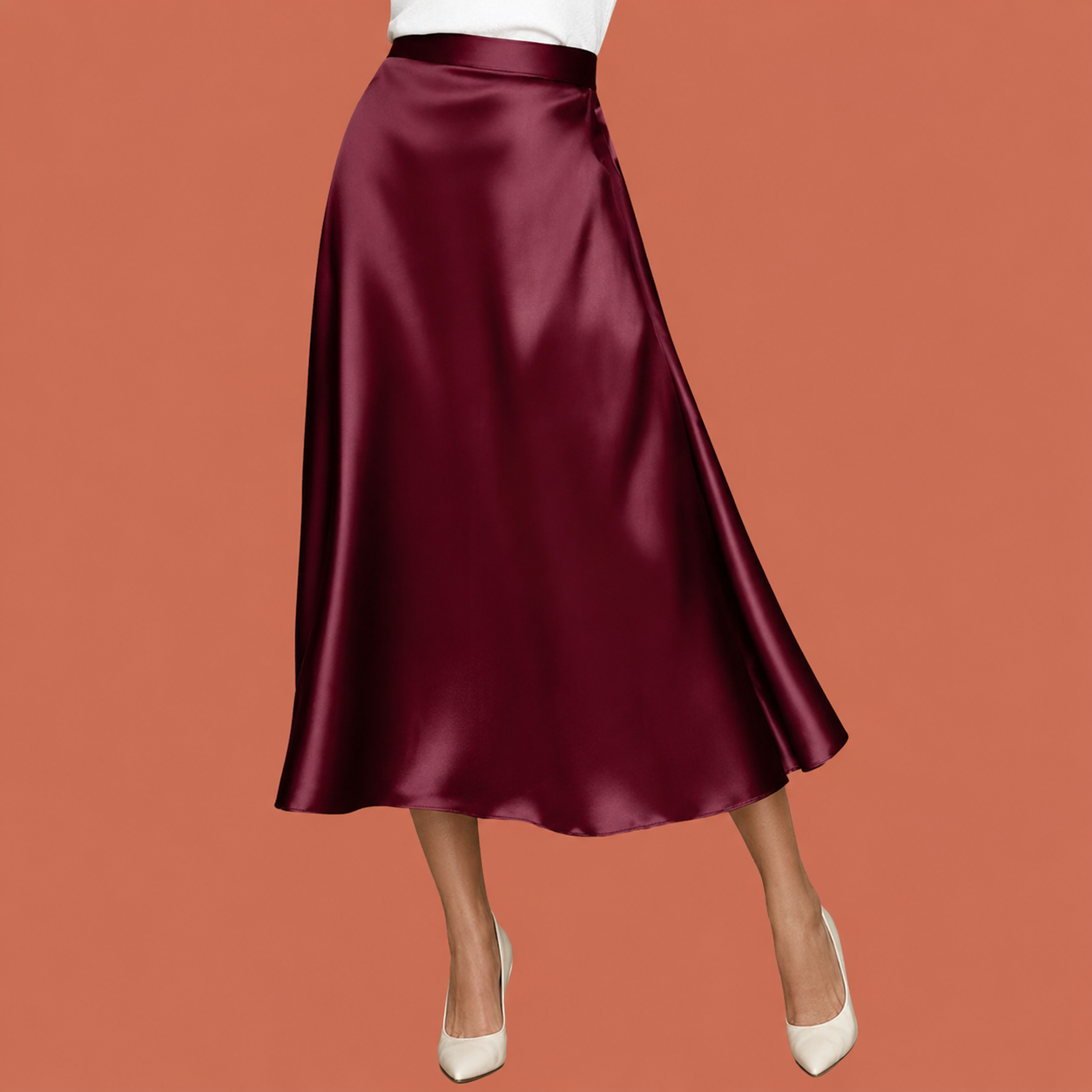 Dames midi rok in bordeaux met minimalistisch design, zacht en comfortabel voor casual en stijlvolle outfits.
