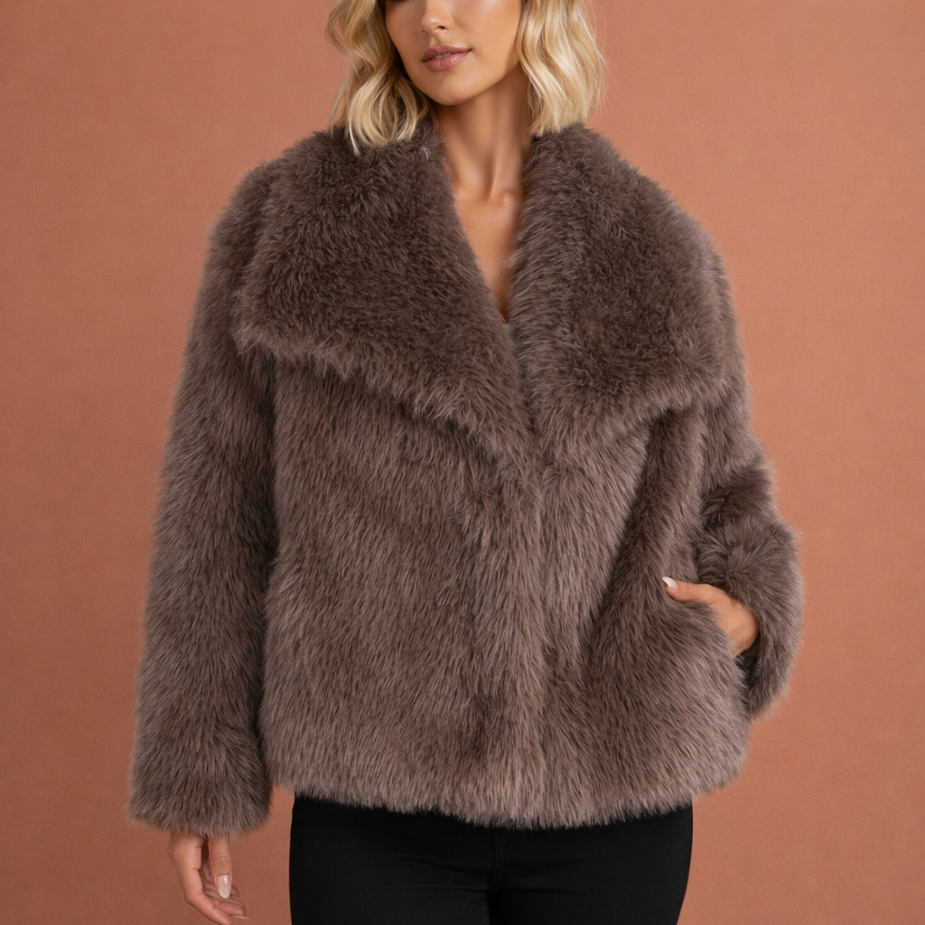 Bruine stijlvolle warme jas voor dames met comfortabele pasvorm en tijdloze uitstraling, ideaal voor herfst en winter.