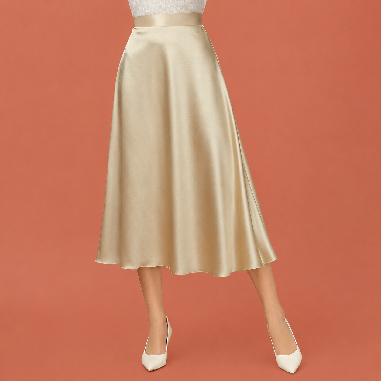 Dames midi rok in champagne met minimalistisch design, zacht en comfortabel voor casual en stijlvolle outfits.