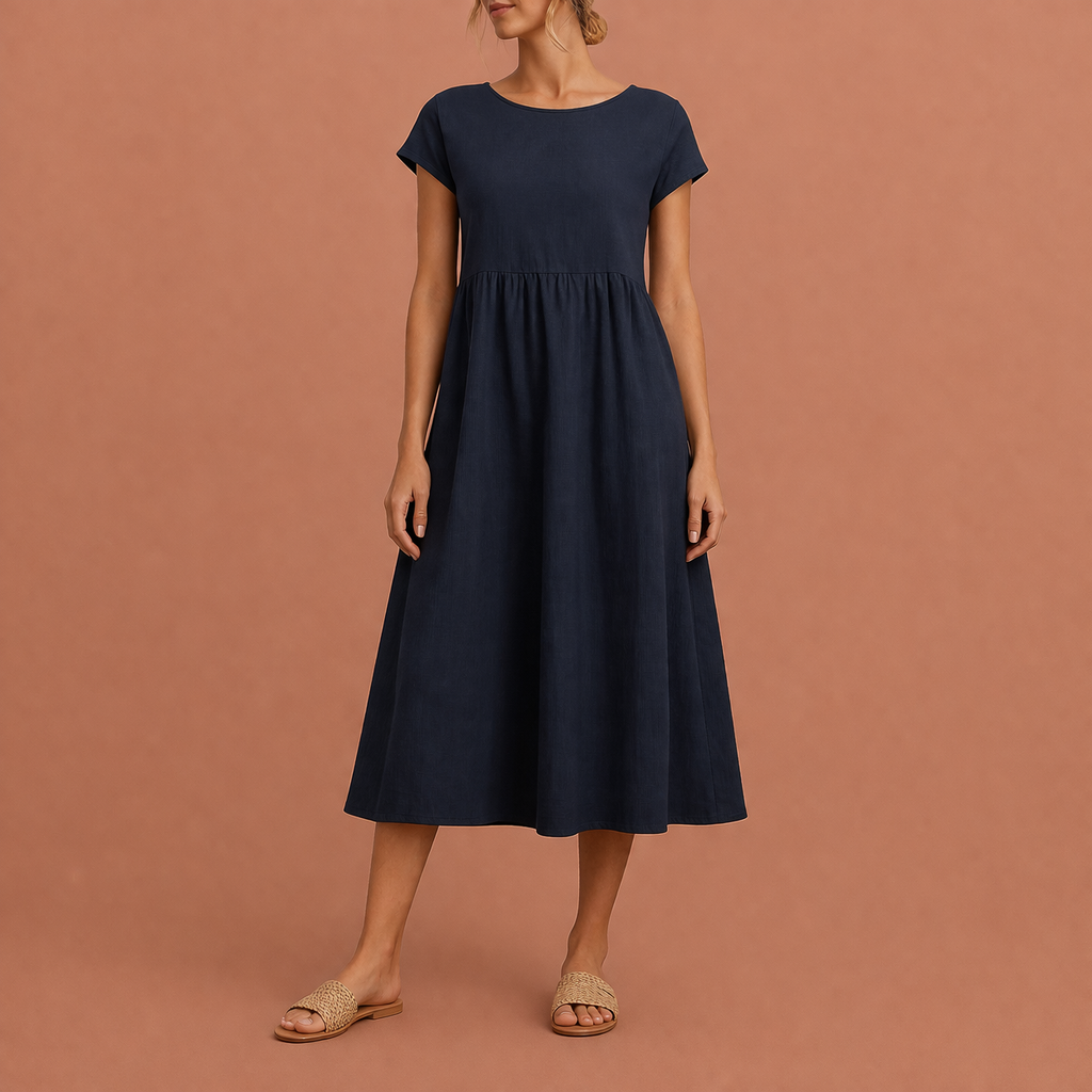 Dames midi jurk in donkerblauw met minimalistisch design, zacht en comfortabel voor casual en stijlvolle outfits.