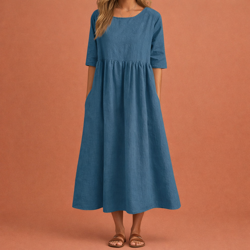 Dames maxi jurk in donkerblauw met minimalistisch design, zacht en comfortabel voor casual en stijlvolle outfits.