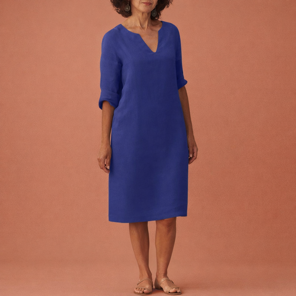 Dames midi zomerjurk in donkerblauw met minimalistisch design, zacht en comfortabel voor casual en stijlvolle outfits.