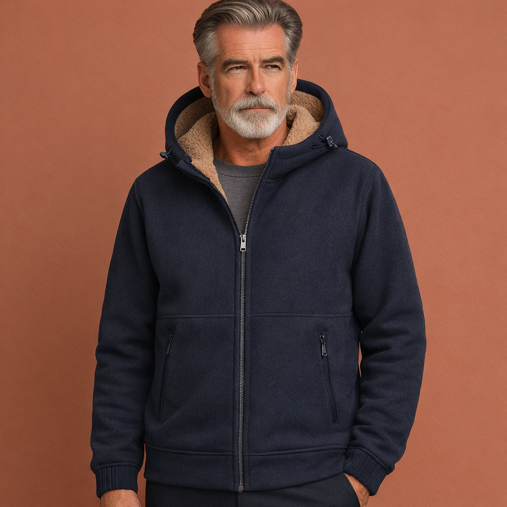Donkerblauwe herenjas met capuchon en ritssluiting, comfortabele pasvorm en geschikt voor dagelijks gebruik in herfst en winter.