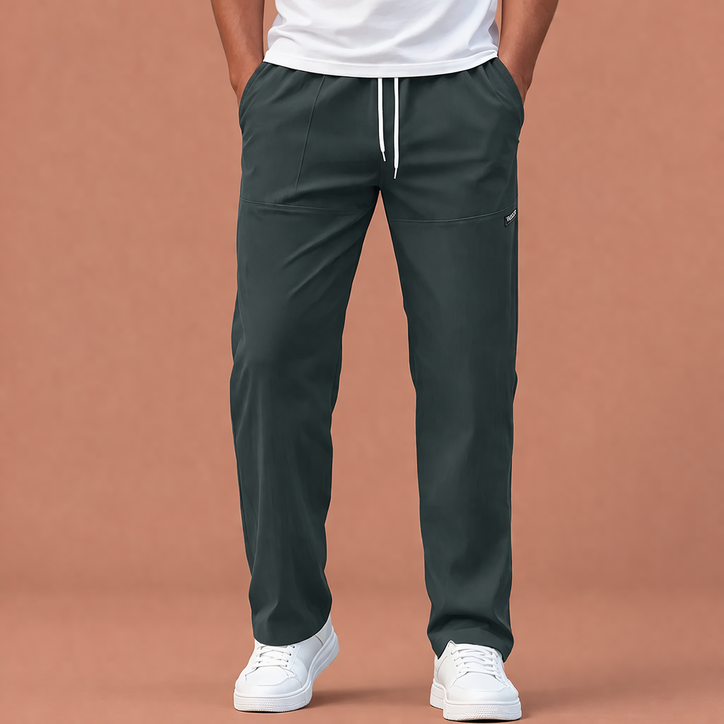 Dames broek in donkergrijs met minimalistisch design, zacht en comfortabel voor casual en stijlvolle outfits.