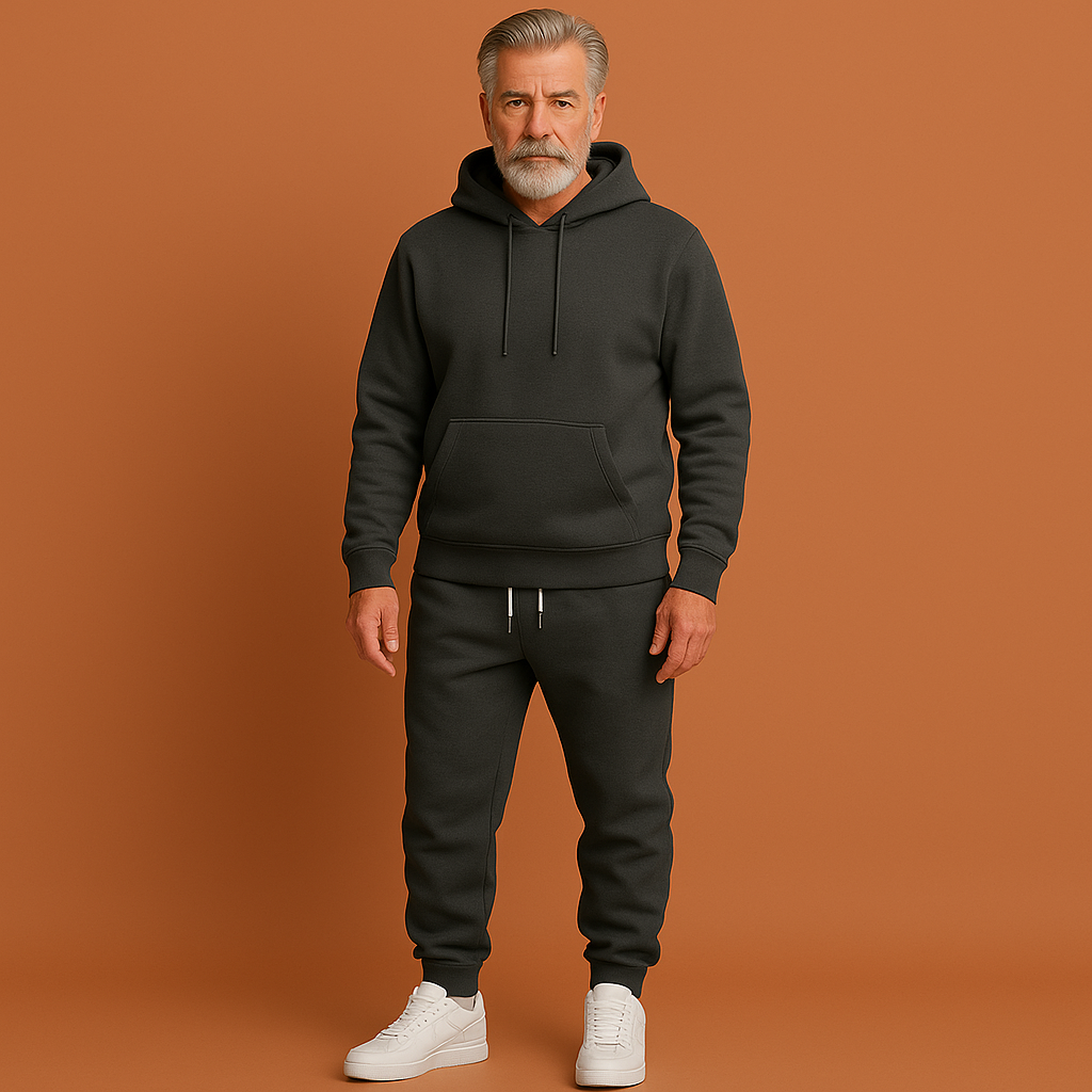 Donkergrijs heren trainingspak met hoodie en tapered joggers, geschikt voor casual outfits en dagelijks gebruik.