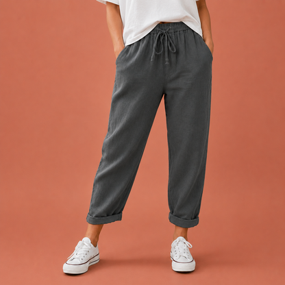 Dames broek in donkergrijs met minimalistisch design, zacht en comfortabel voor casual en stijlvolle outfits.
