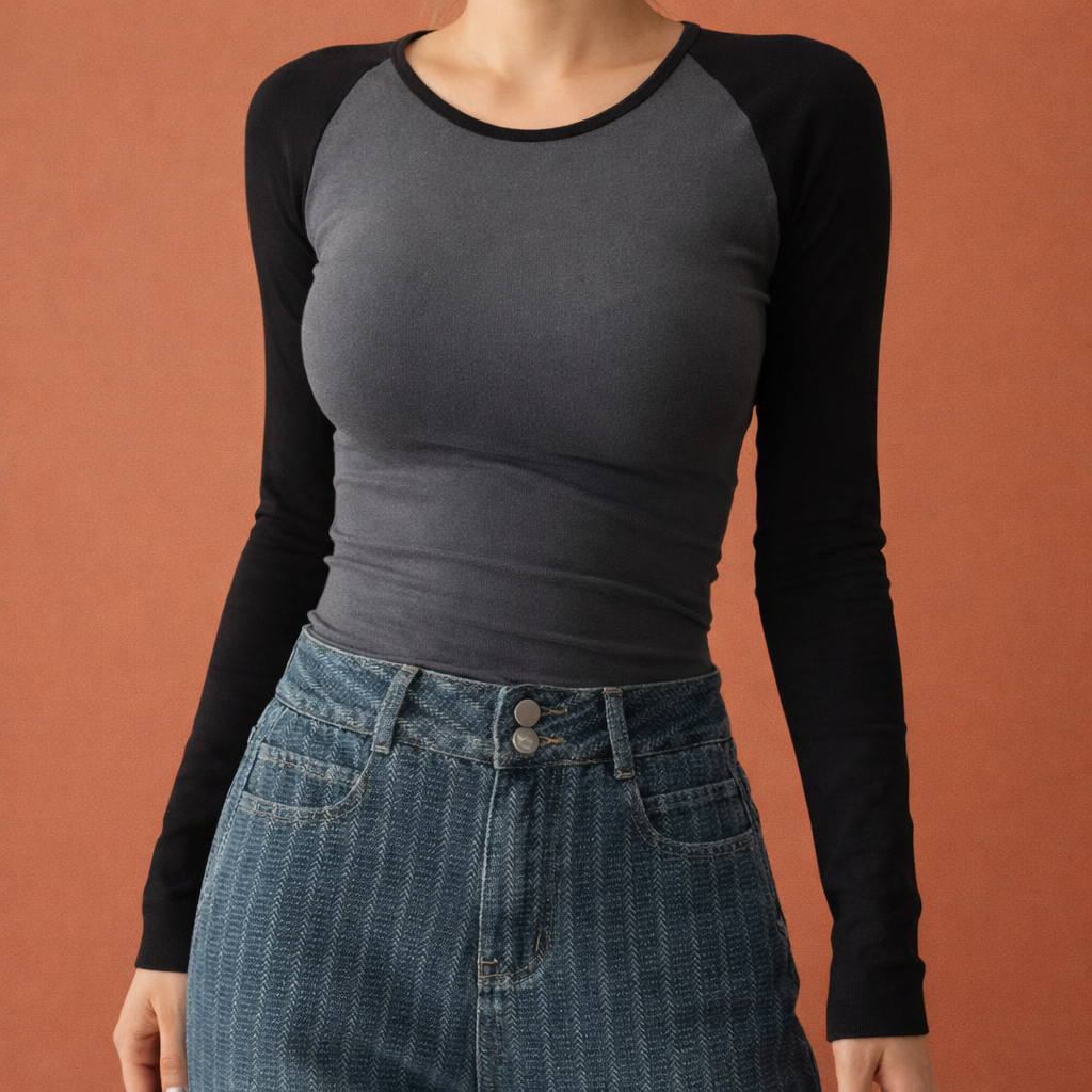 Dames raglan t-shirt in donkergrijs met minimalistisch design, zacht en comfortabel voor casual en stijlvolle outfits.