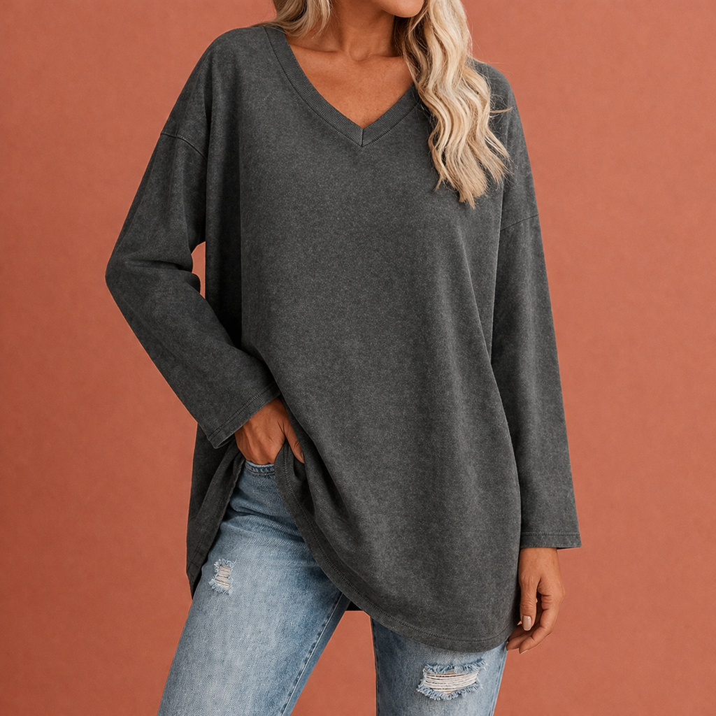 Dames tuniek in donkergrijs met minimalistisch design, zacht en comfortabel voor casual en stijlvolle outfits.