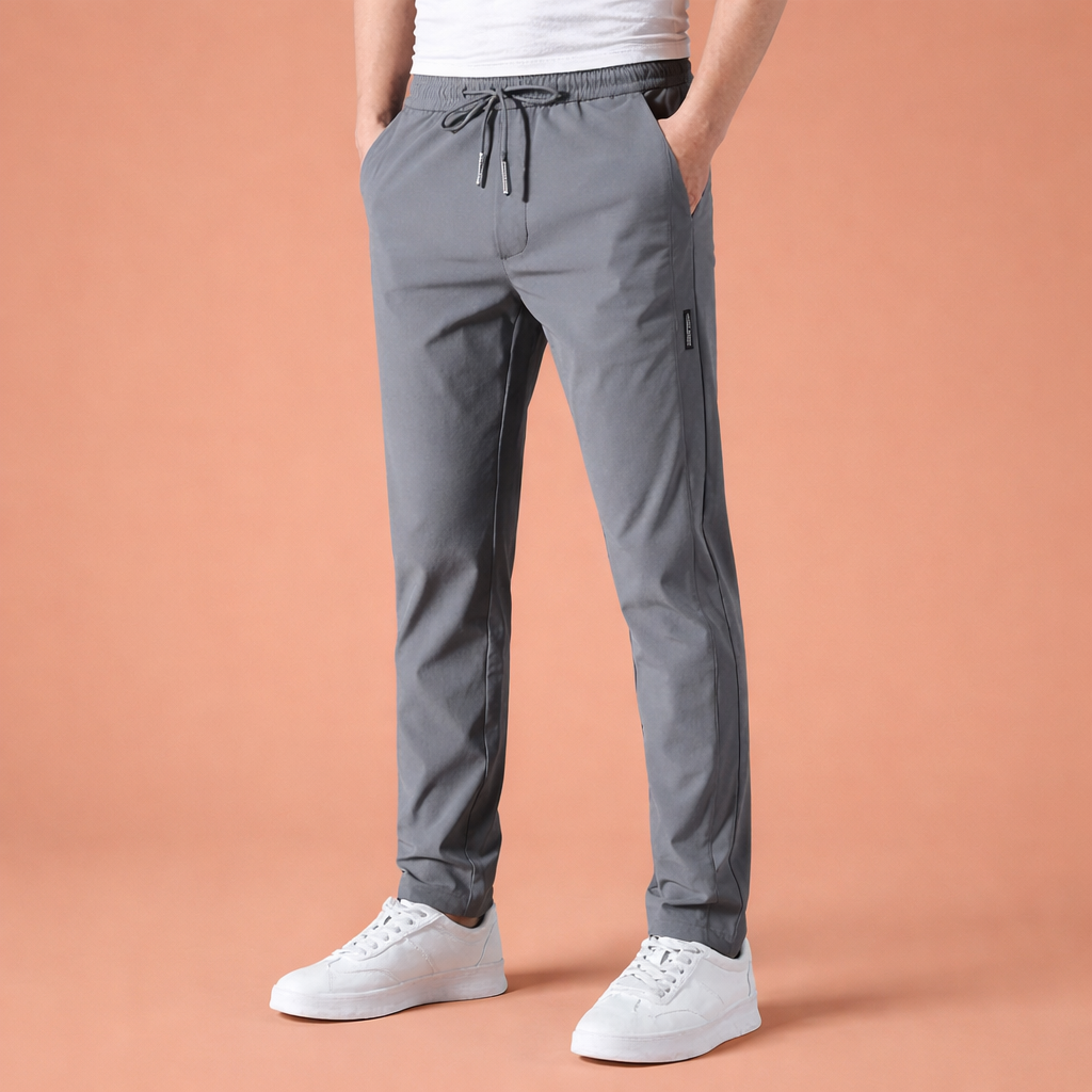 Dames broek in donkergrijs met minimalistisch design, zacht en comfortabel voor casual en stijlvolle outfits.