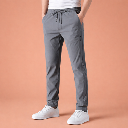 Dames broek in donkergrijs met minimalistisch design, zacht en comfortabel voor casual en stijlvolle outfits.