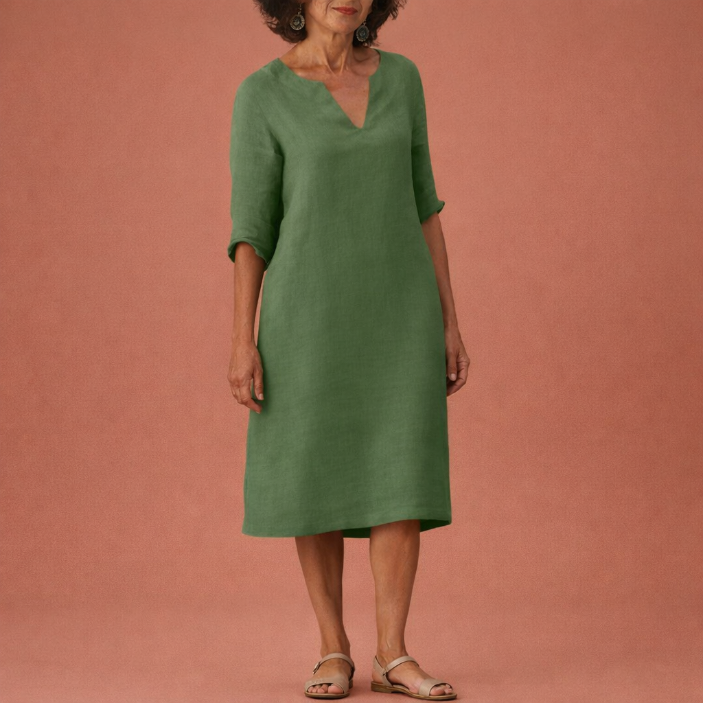 Dames midi zomerjurk in donkergroen met minimalistisch design, zacht en comfortabel voor casual en stijlvolle outfits.