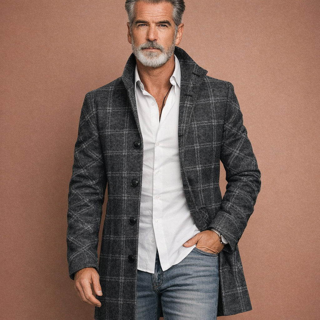 Donkerzwarte winddichte lange jas voor heren met comfortabele pasvorm, geschikt voor dagelijks gebruik in herfst en winter.