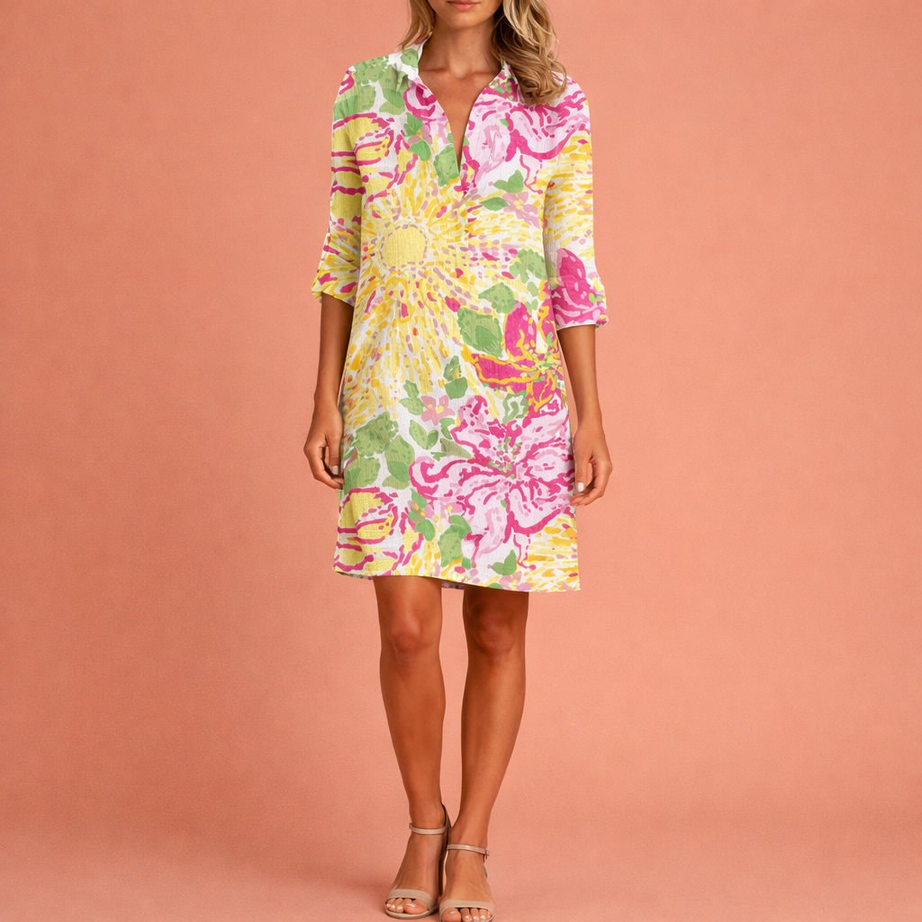 Dames midi zomerjurk in gele bloemen met minimalistisch design, zacht en comfortabel voor casual en stijlvolle outfits.