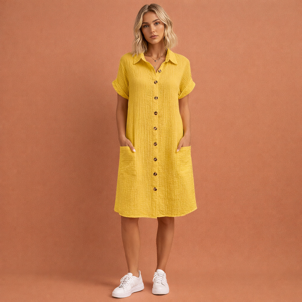 Gele casual hemdjurk voor dames met knoopsluiting en luchtige pasvorm, ideaal voor zomerse dagen.