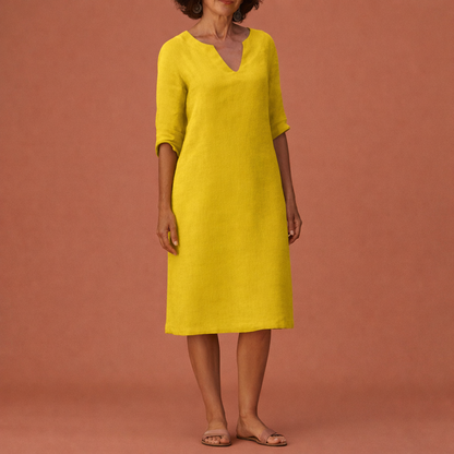 Dames midi zomerjurk in geel met minimalistisch design, zacht en comfortabel voor casual en stijlvolle outfits.