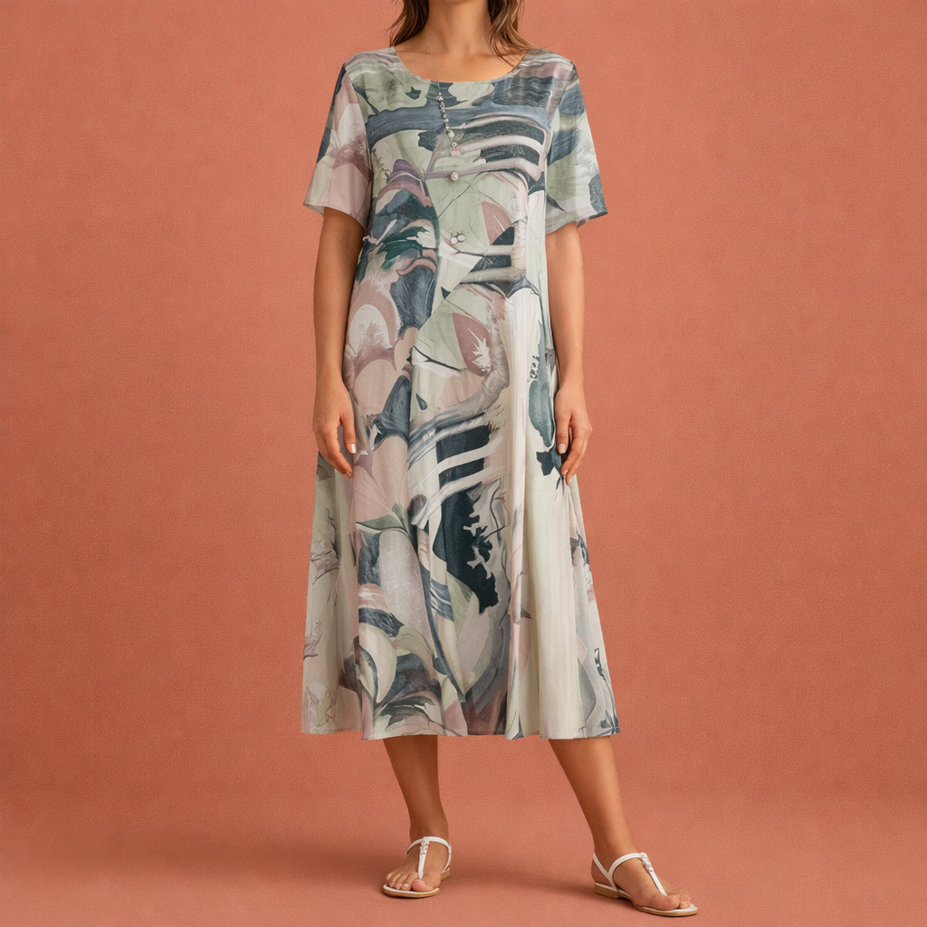 Dames midi zomerjurk in grijs met minimalistisch design, zacht en comfortabel voor casual en stijlvolle outfits.