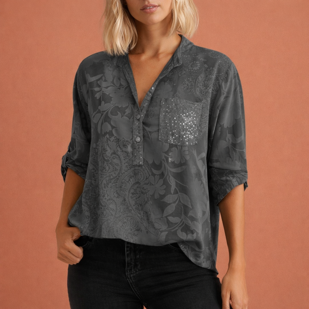 Dames blouse in grijs met minimalistisch design, zacht en comfortabel voor casual en stijlvolle outfits.