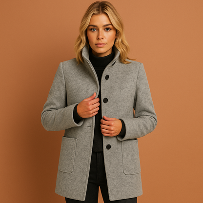 Dames manteljas in grijs met knoopsluiting en rechte pasvorm, warm en stijlvol voor herfst en winter.