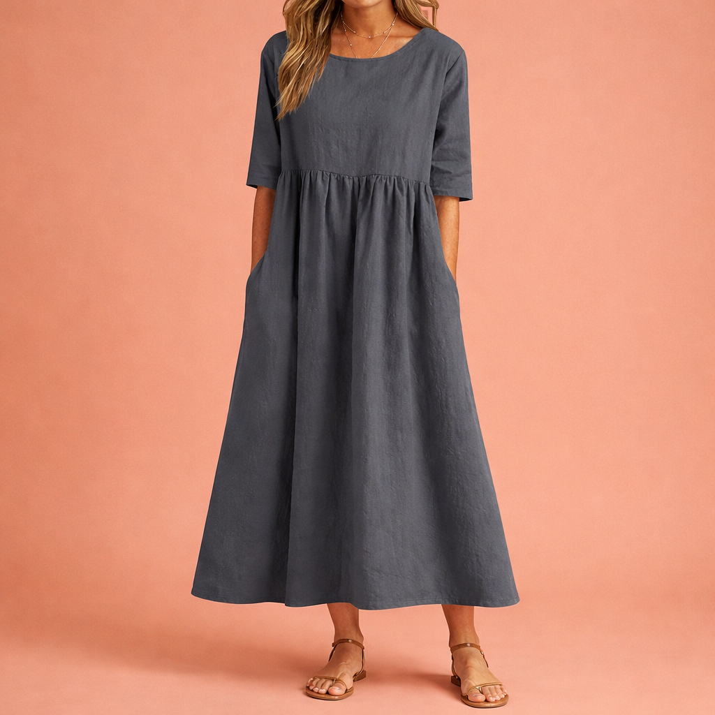 Dames maxi jurk in grijs met minimalistisch design, zacht en comfortabel voor casual en stijlvolle outfits.