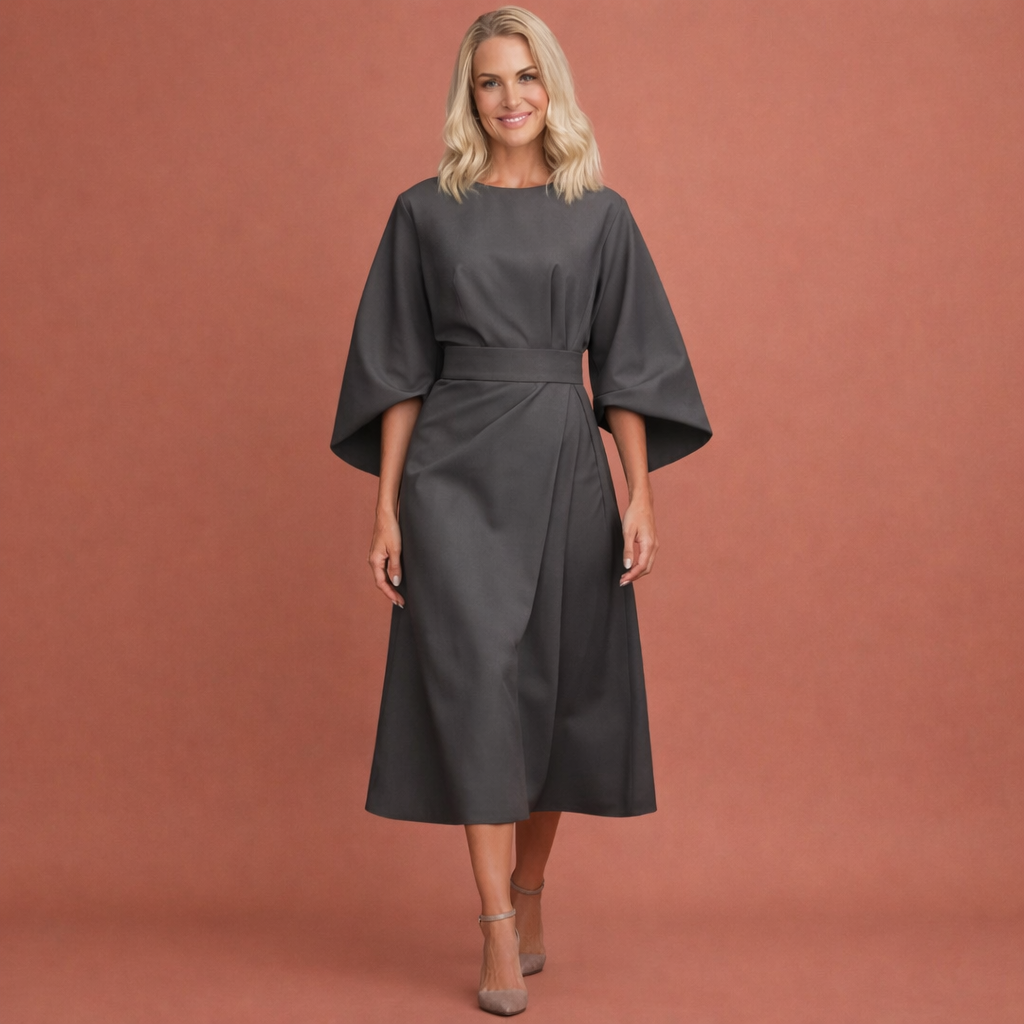 Dames maxi jurk in grijs met minimalistisch design, zacht en comfortabel voor casual en stijlvolle outfits.