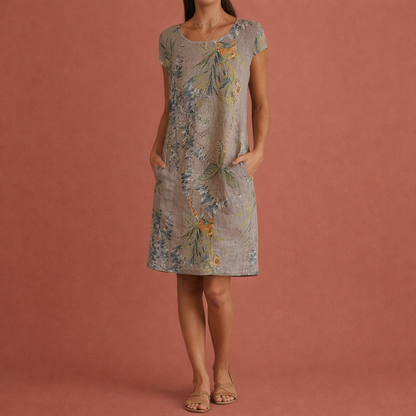 Dames midi-jurk in grijs met minimalistisch design, zacht en comfortabel voor casual en stijlvolle outfits.