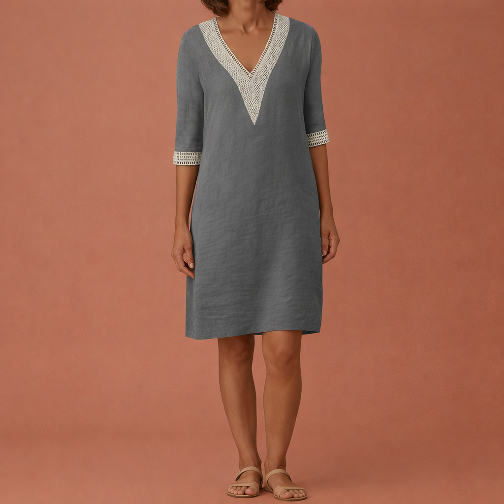 Dames midi jurk in grijs met minimalistisch design, zacht en comfortabel voor casual en stijlvolle outfits.