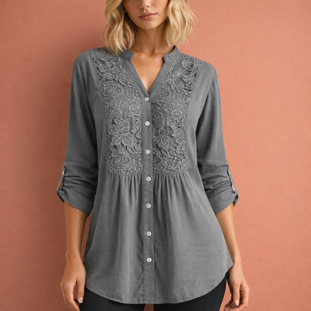 Dames tuniekblouse in grijs met minimalistisch design, zacht en comfortabel voor casual en stijlvolle outfits.