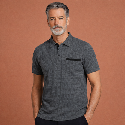 Heren polo in grijs met klassieke kraag, stijlvol en comfortabel voor casual en verzorgde outfits.