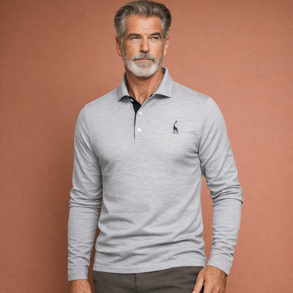 Heren polo in grijs met minimalistisch design, zacht en comfortabel voor casual en stijlvolle outfits.