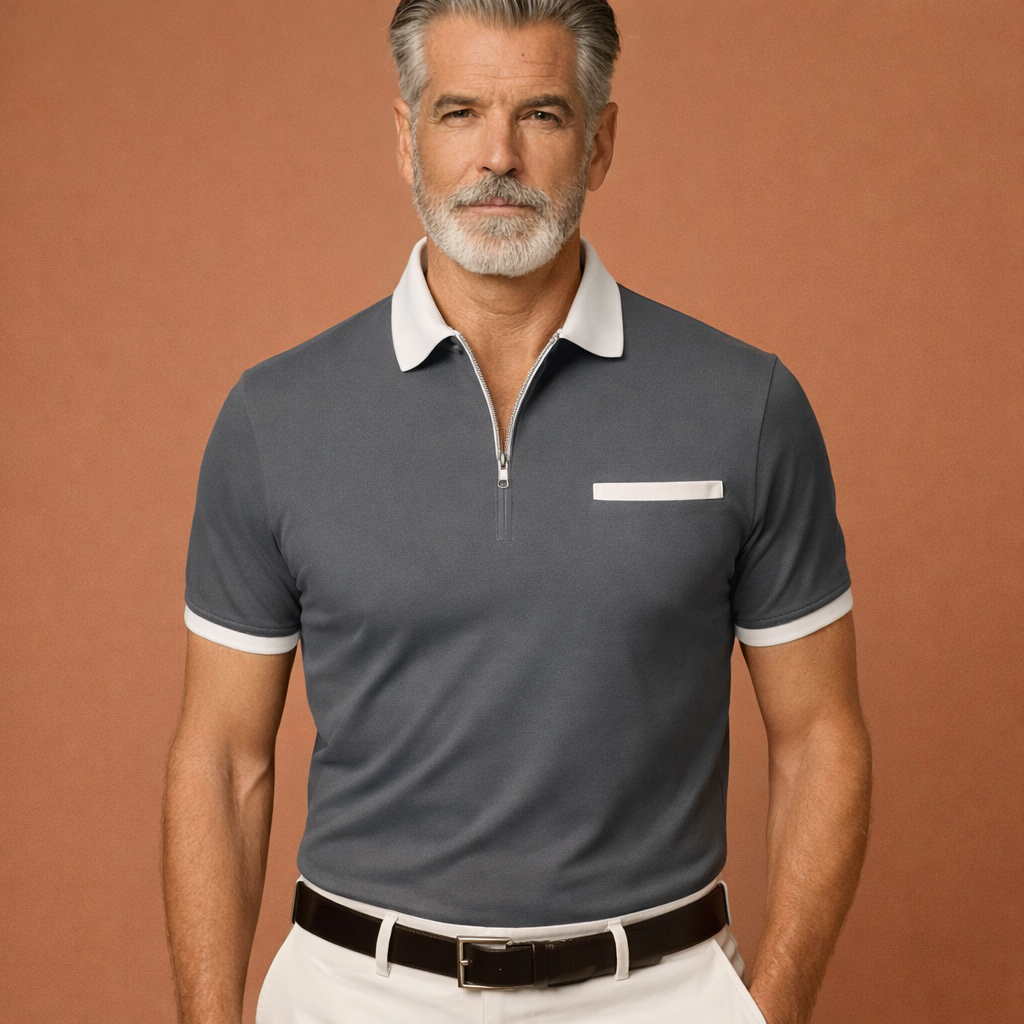 Heren polo in grijs met minimalistisch design, zacht en comfortabel voor casual en stijlvolle outfits.