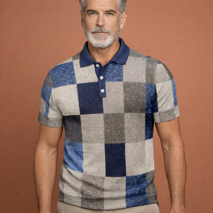 Heren polo in grijs met rasterpatroon, stijlvol en comfortabel voor casual en zomerse outfits.