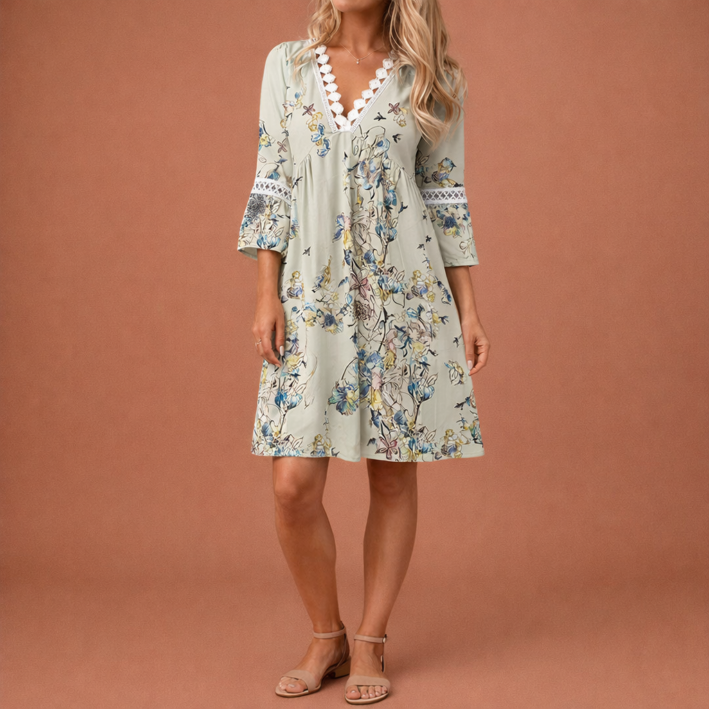 Dames midi jurk in grijs met minimalistisch design, zacht en comfortabel voor casual en stijlvolle outfits.