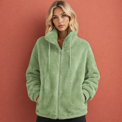 Groen dames vest met ritssluiting en opstaande kraag, comfortabel voor dagelijks gebruik tijdens frisse dagen.