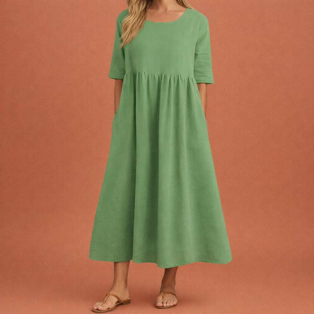Dames maxi jurk in groen met minimalistisch design, zacht en comfortabel voor casual en stijlvolle outfits.
