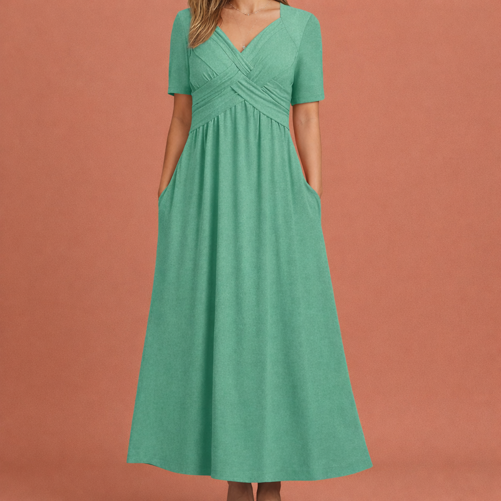 Dames maxi zomerjurk in groen met minimalistisch design, zacht en comfortabel voor casual en stijlvolle outfits.