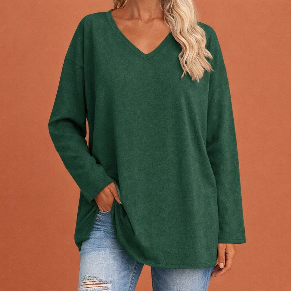 Dames tuniek in groen met minimalistisch design, zacht en comfortabel voor casual en stijlvolle outfits.