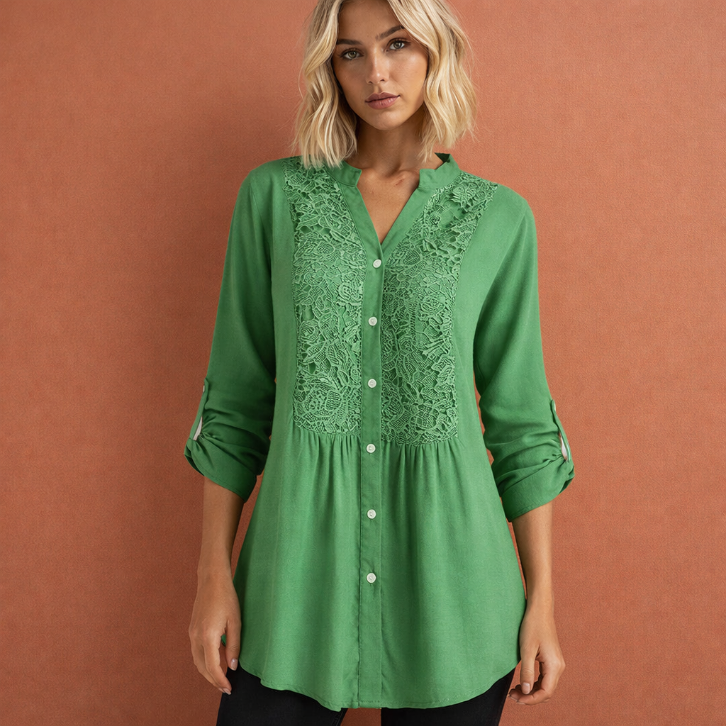 Dames tuniekblouse in groen met minimalistisch design, zacht en comfortabel voor casual en stijlvolle outfits.