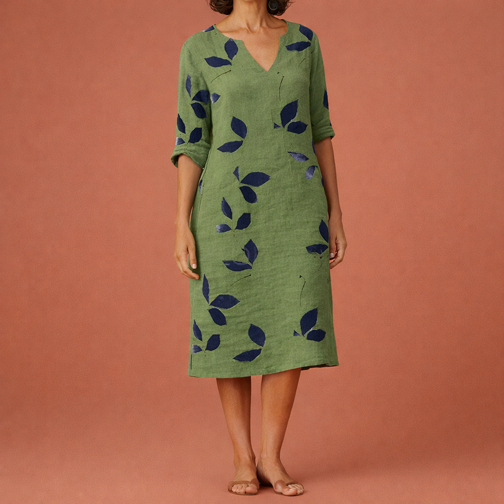Dames midi jurk in groen met bladerenprint, luchtig en comfortabel voor casual en stijlvolle zomeroutfits.