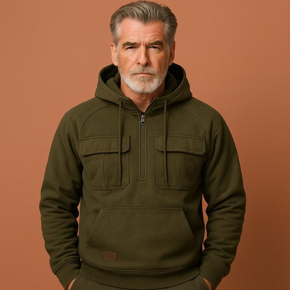 Groene hoodie voor heren met zachte pasvorm en praktische zakken, ideaal voor koude dagen en casual outfits.