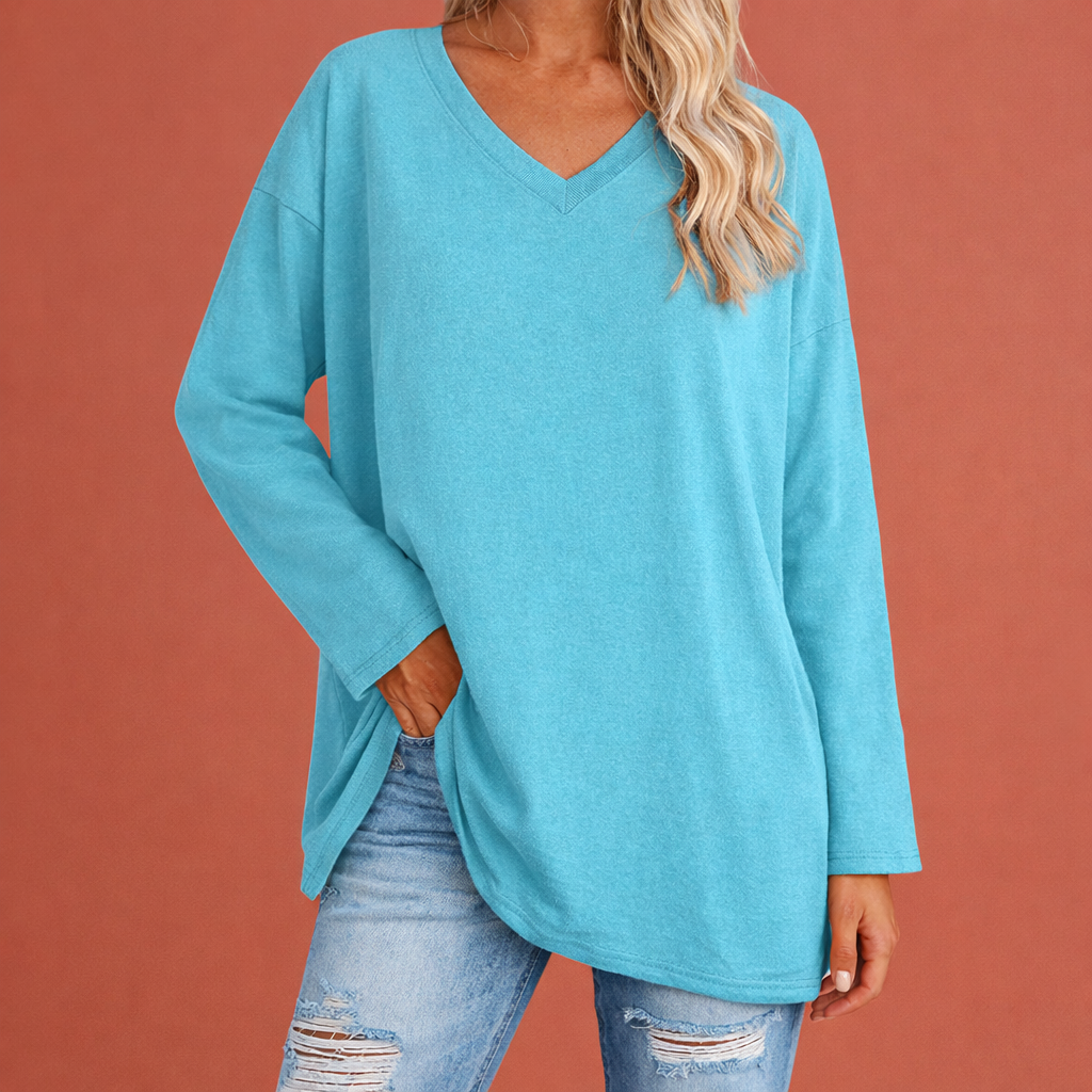 Dames tuniek in hemelsblauw met minimalistisch design, zacht en comfortabel voor casual en stijlvolle outfits.