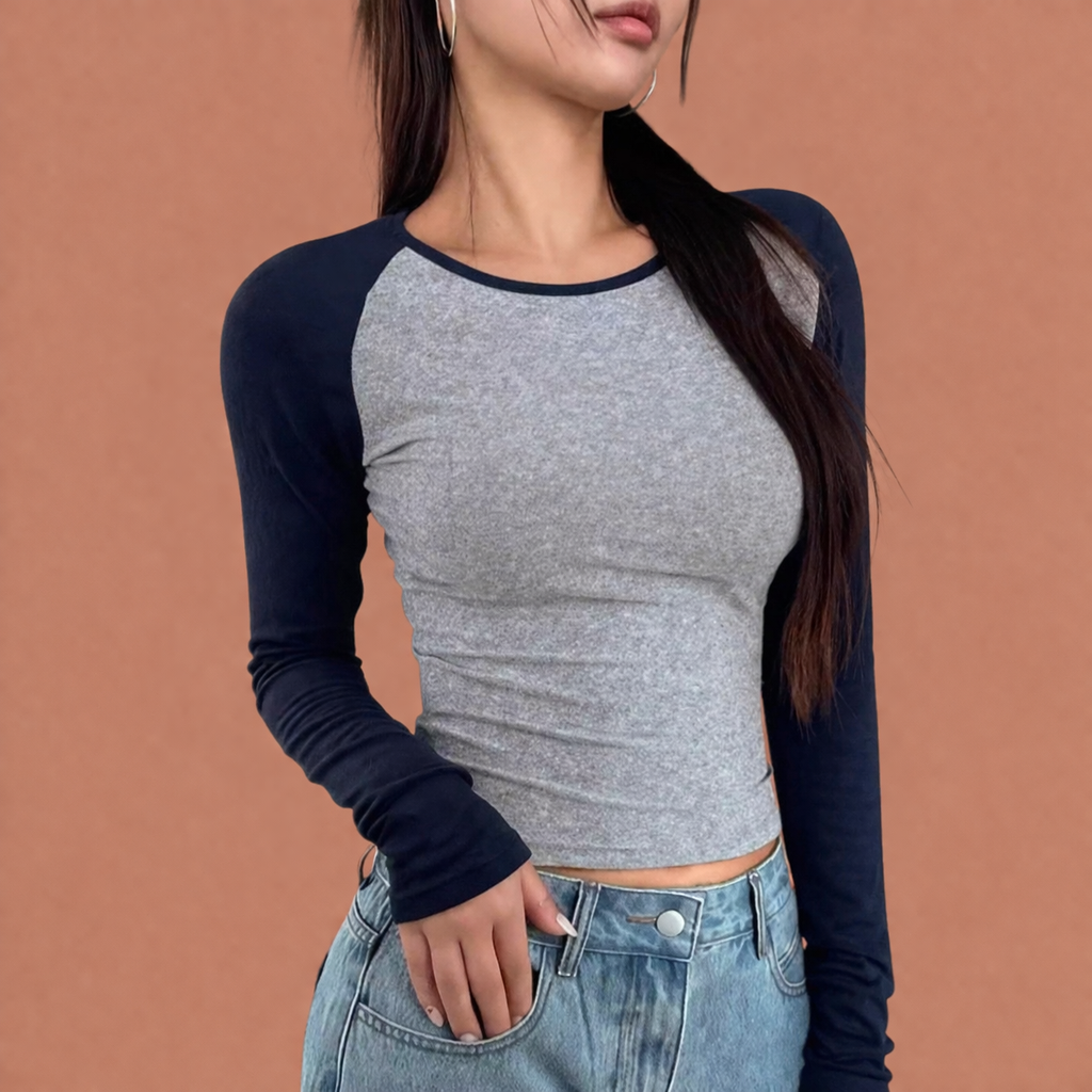 Dames raglan t-shirt in lichtgrijs met minimalistisch design, zacht en comfortabel voor casual en stijlvolle outfits.