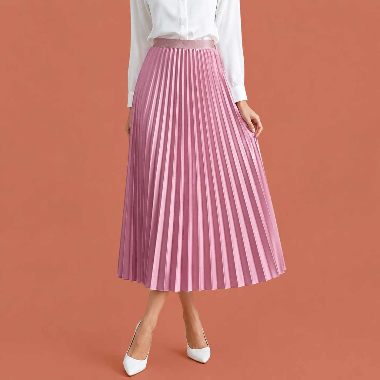 Dames midi rok in lichtroze met minimalistisch design, zacht en comfortabel voor casual en stijlvolle outfits.